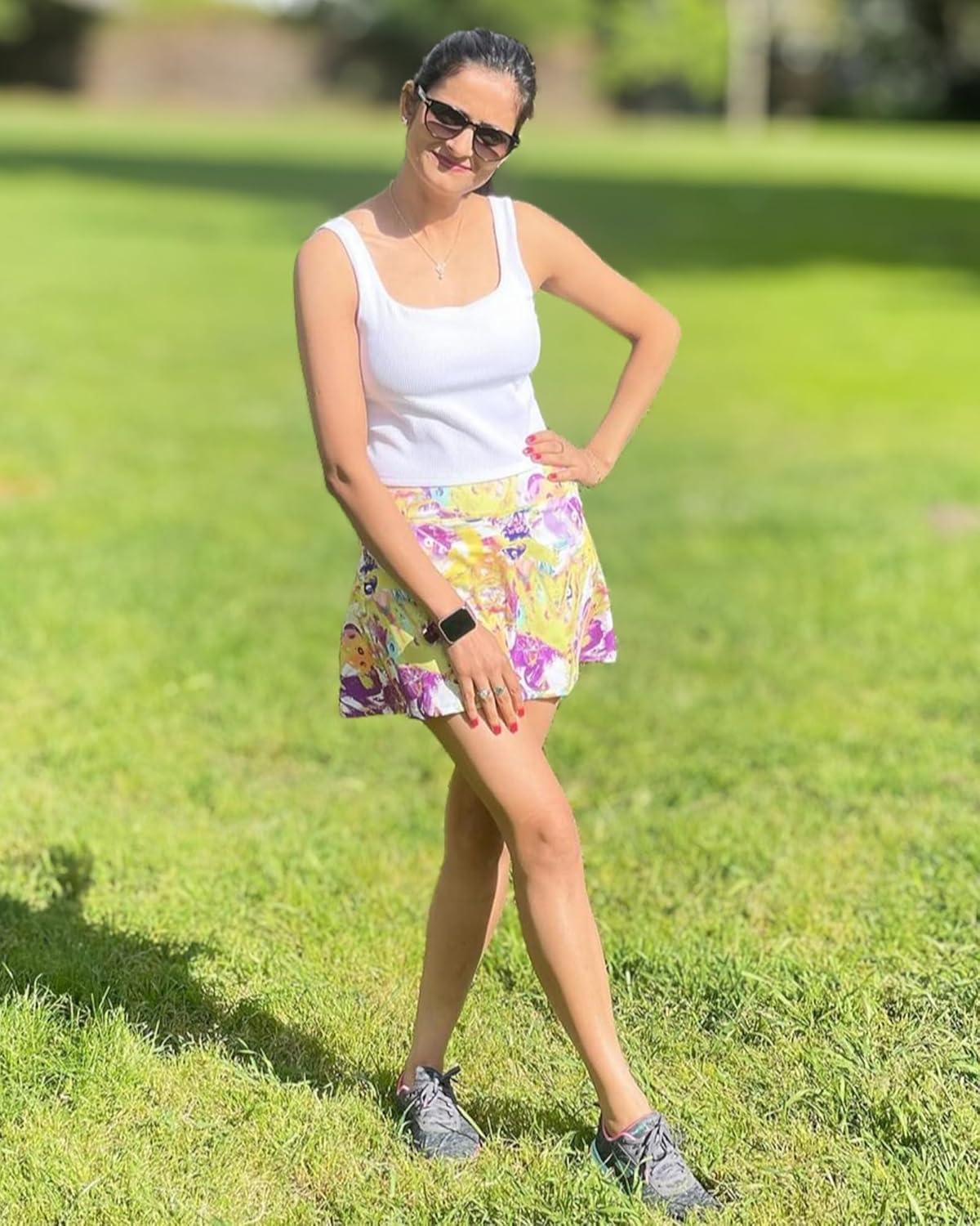 imageStelle Women Tennis Skirt Golf Skorts Athletic High Waisted with Pockets Inner Shorts Sport Workout Pleated PickleballPastel Pickle